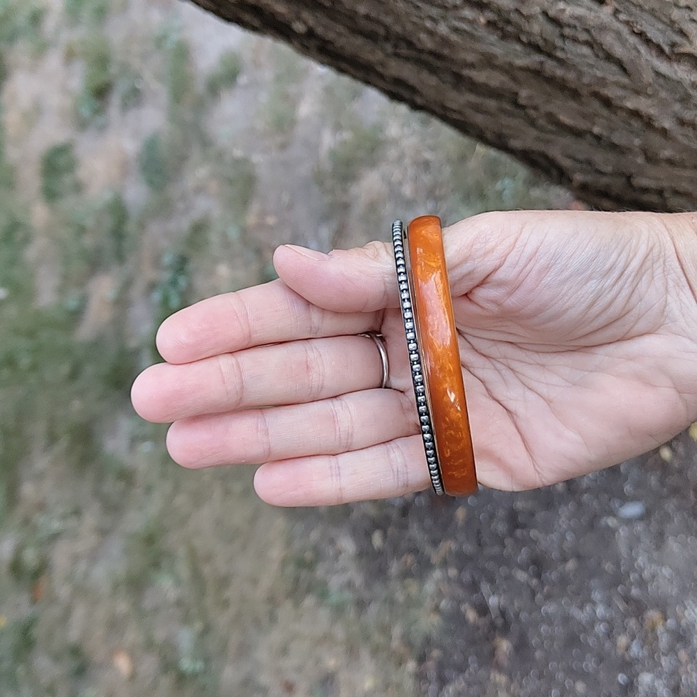 Vintage orange resin/ studded and brass bangles